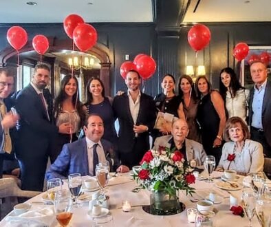 Mort-Zetlin-seated-in-center-and-family-photo-by-Peter-Wehmann-Arlington-Optimist-Club
